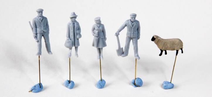 Figures Mounted on Wires