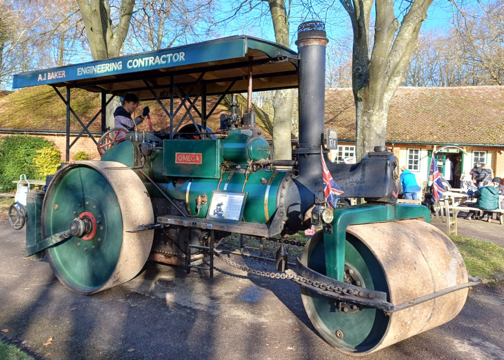 Steam road roller.