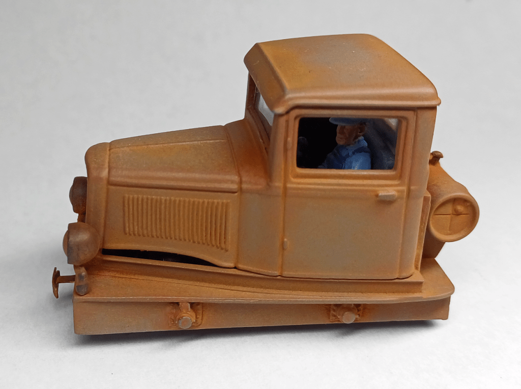 Adding driver to model locomotive cab. 