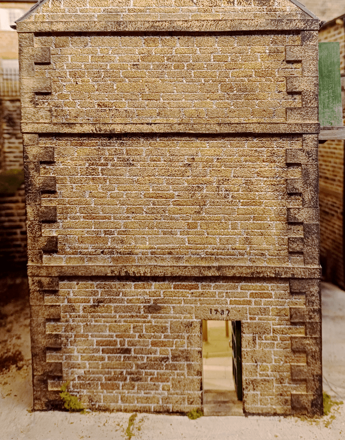 Model railway building made from foam board.