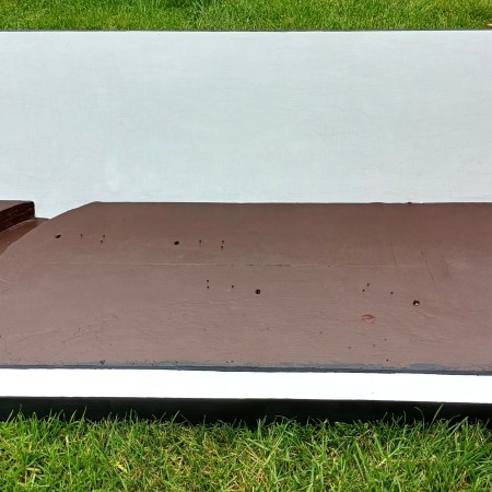 Model railway baseboard and back scene.