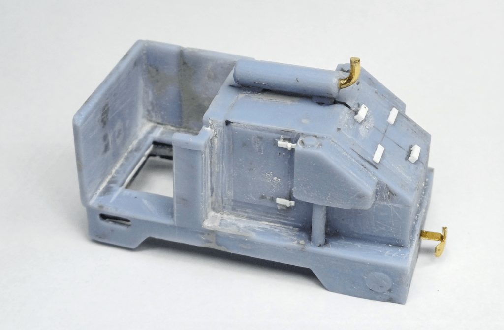 Adding additional details to a 3D printed model locomotive body.