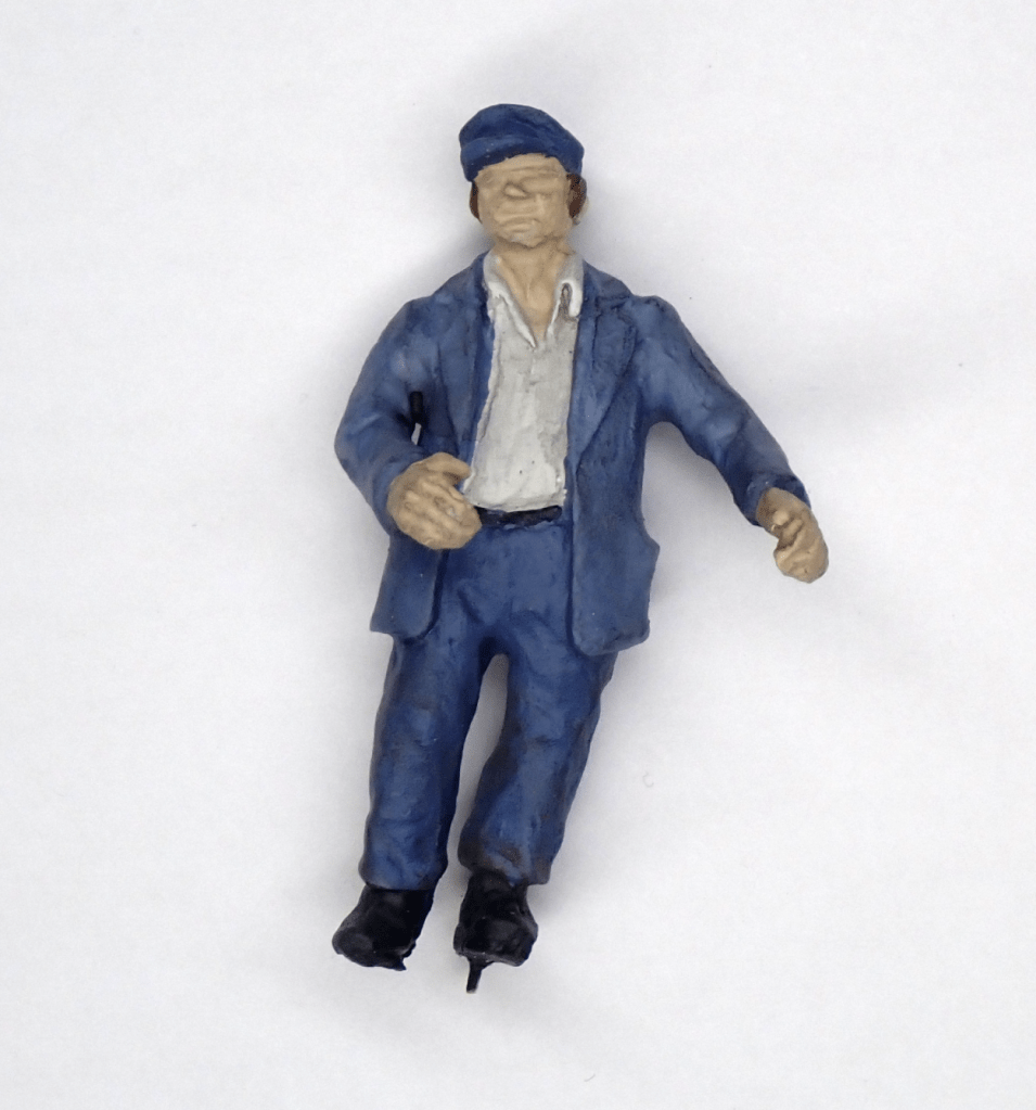 Painted Figure for an O scale model railway locomotive driver
