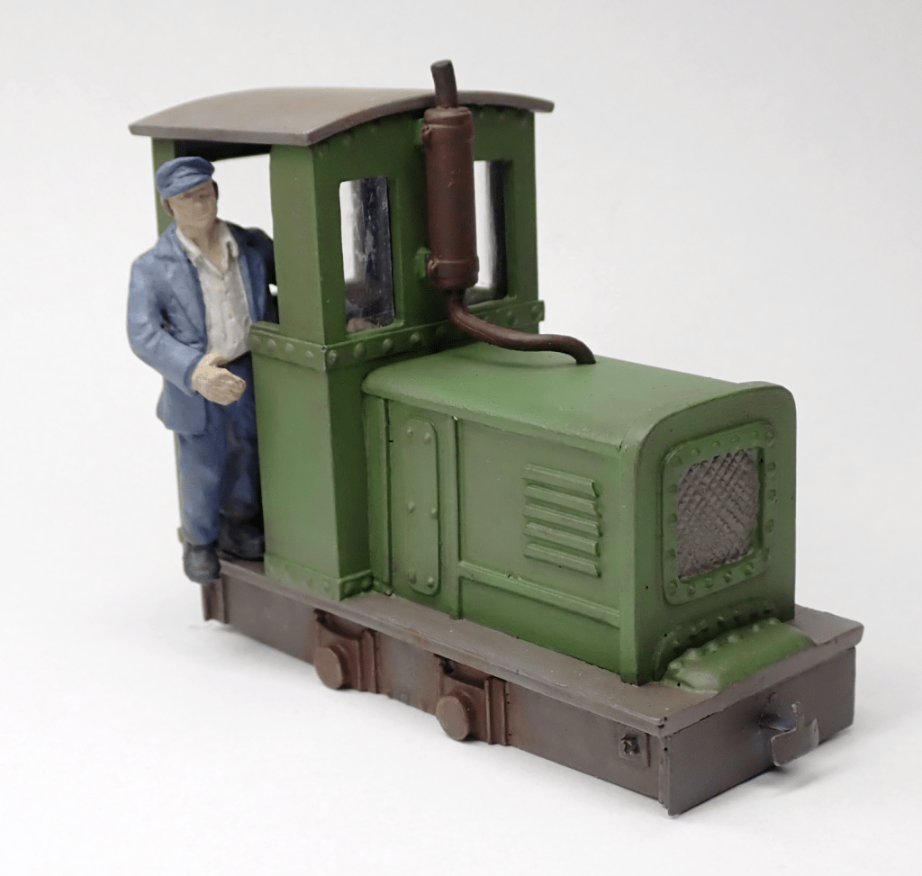 Completed O9 On18 narrow gauge model railway locomotive body with driver