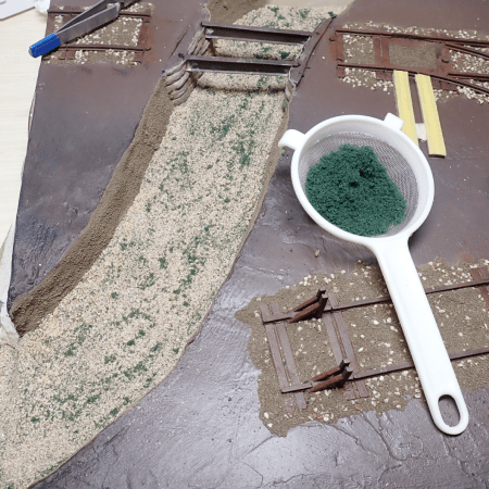 Creating a river on a model railway layout - creating the riverbed.