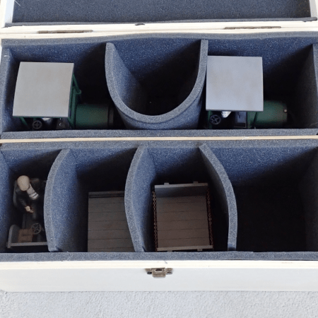 Homemade model railway stock box containing locomotives and wagons