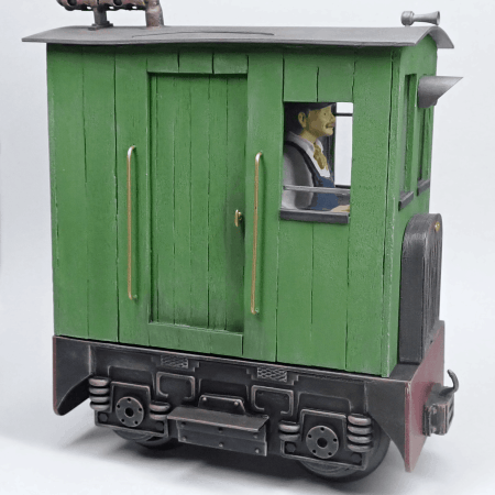 The completed SM32 16mm scale box cab locomotive made from wooden stirrers and a toy train chassis